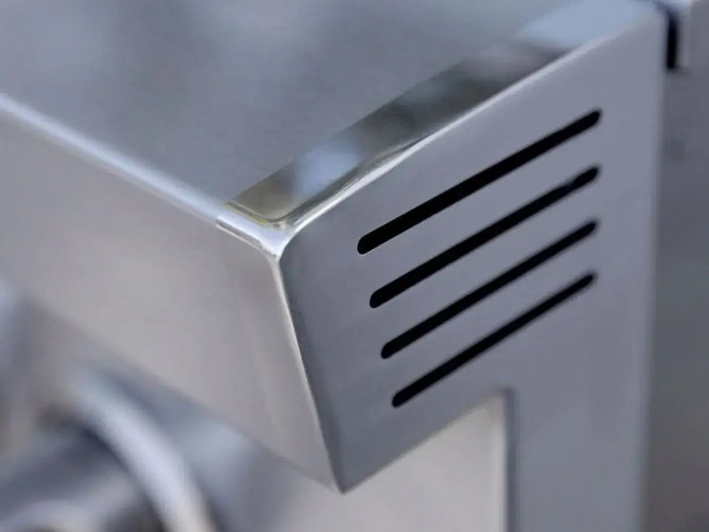 Polished stainless steel finish and ventilation of the American Made Grills ATSSB2 outdoor side cooktop