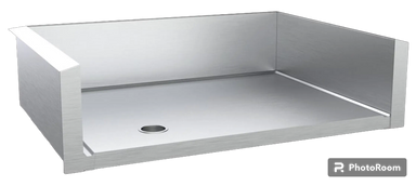 Angled view of stainless steel drop-in griddle liner with rear and side splash guards