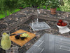 Sunstone A-SS17 outdoor kitchen drop-in sink installed in granite countertop with hot/cold faucet, prep area for washing produce and tools.