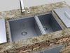 Sunstone B-SK34 34-inch 304 stainless double basin sink installed in outdoor kitchen countertop with faucet and soap dispenser.