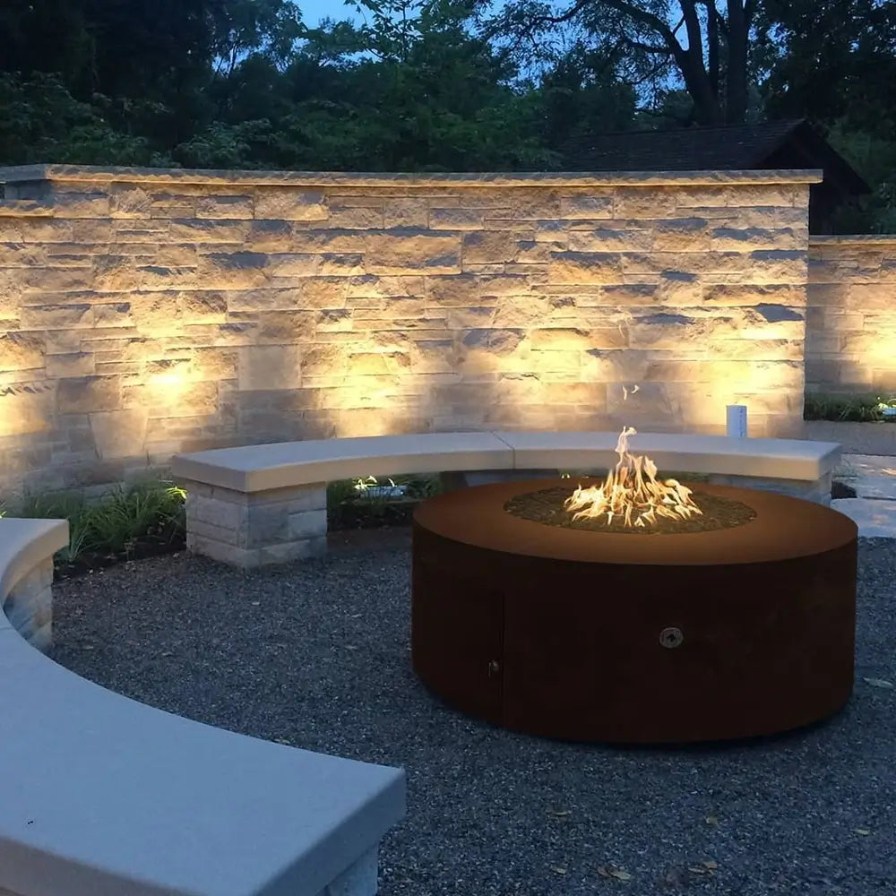 The Outdoor Plus Unity Fire Pit – 24" Tall Round Design Corten Steel Night Lifestyle