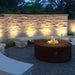 The Outdoor Plus Unity Fire Pit – 24" Tall Round Design Corten Steel Night Lifestyle