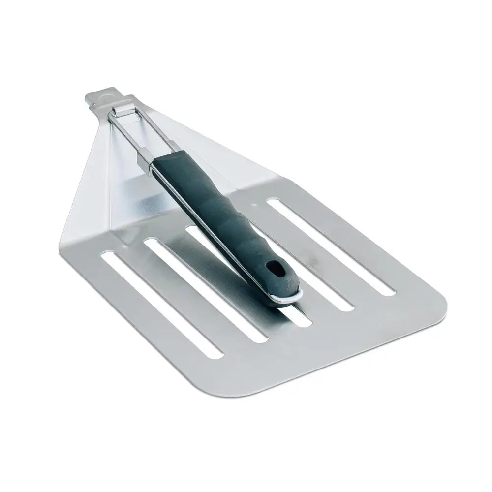 Angled view of the Summerset folding pizza peel, a key tool in the SSTOAK-1 outdoor accessory kit.