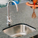 Summerset SNK-19U undermount outdoor sink with modern gooseneck faucet and granite countertop.