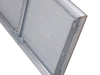 Close-up of Sunstone BA-DD42 304 stainless steel access door frame showing hinge side, mounting flange, and brushed finish detail.