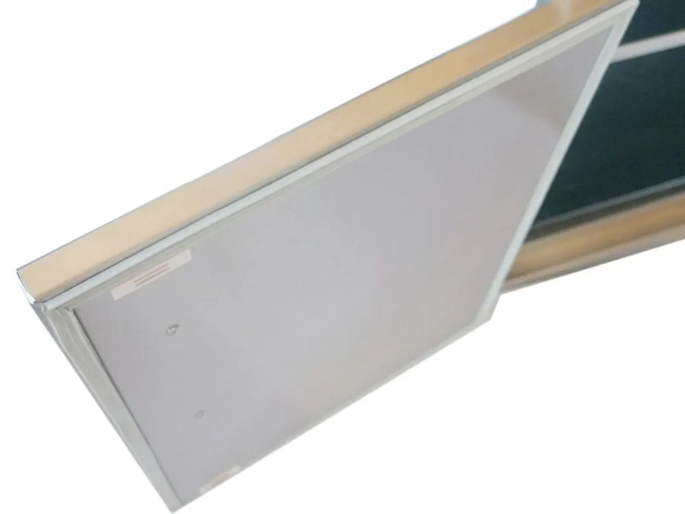 Close-up of Sunstone BA-DSH30 door edge showing weather gasket seal and stainless steel frame for outdoor kitchen dry storage.