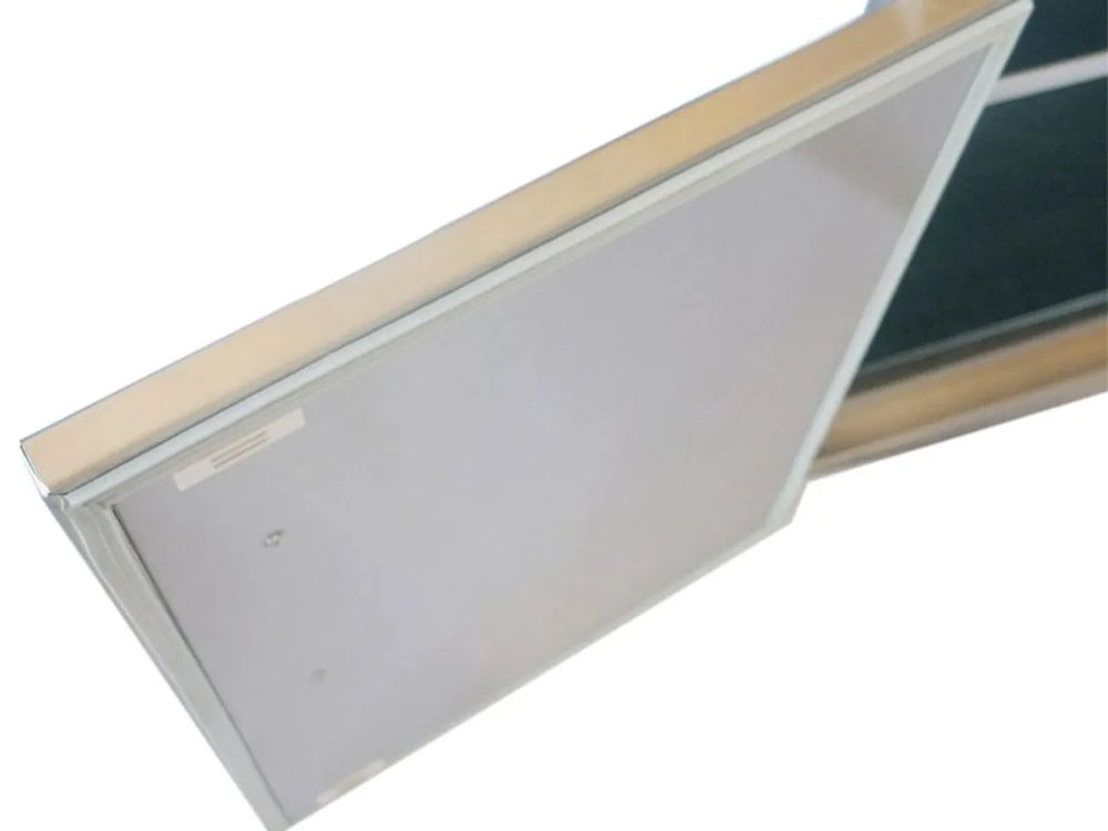 Close-up of Sunstone BA-DSV1724 pantry door edge and gasket seal, highlighting weather-resistant stainless steel construction.