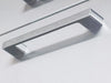 Close-up of Sunstone BA-DSV1724 stainless steel bar handle on weather-sealed dry storage pantry door.