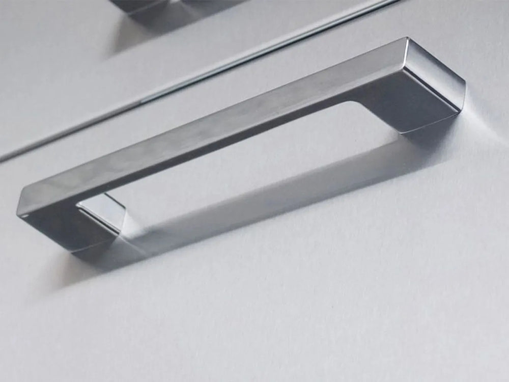 Close-up of Sunstone stainless steel drawer handle on BA-TRD2027 outdoor kitchen trash drawer cabinet.