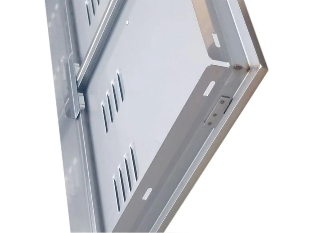 Close-up of Sunstone BA-VDD36 vented 304 stainless access door showing hinge side, mounting flange, and vent cutouts.