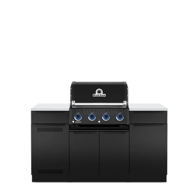 Front view of the Broil King Baron 420i Pro Shadow Island outdoor gas grill in matte black finish with blue LED backlit control knobs and stainless steel workspaces.