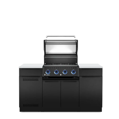 Open-lid view of the Broil King Baron 420i Pro Shadow Island gas grill, showcasing the heavy-duty cooking grates and premium infrared side burner.