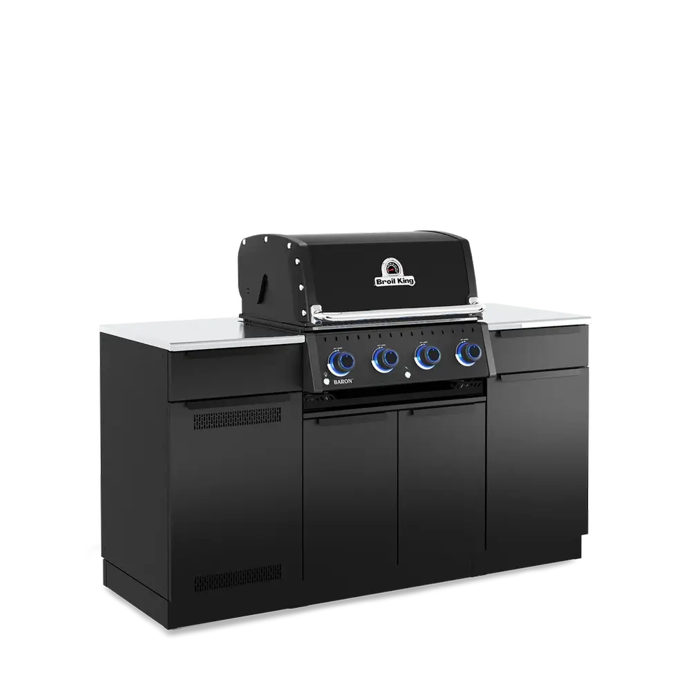 Three-quarter left perspective of the Broil King Baron 420i Pro Shadow outdoor kitchen island, highlighting the sleek black cabinetry and integrated storage drawers.