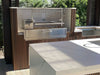 Tagwood BBQ05SS built-in Santa Maria grill installed in luxury outdoor kitchen setup