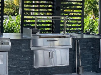 Tagwood BBQ05SS built-in Santa Maria grill installed in outdoor kitchen island stainless steel front view