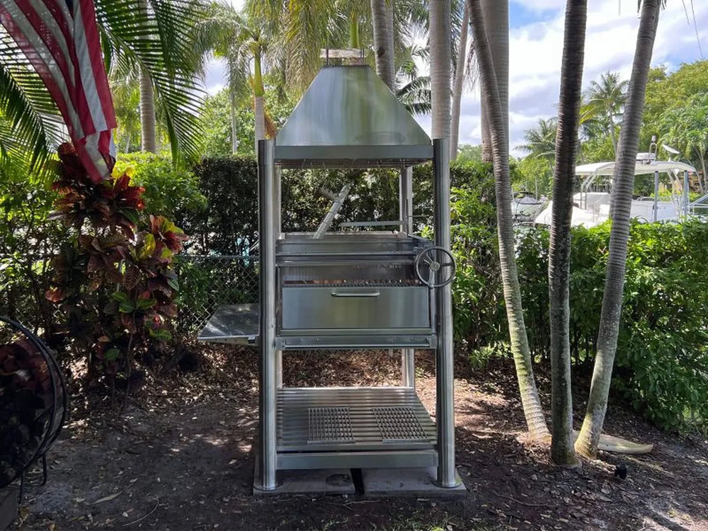 Tagwood BBQ BBQ12SS Gaucho grill with firebox door open and interior grate system