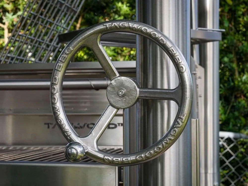 Tagwood BBQ BBQ12SS close-up of stainless steel crank wheel lift mechanism
