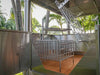 Tagwood BBQ BBQ12SS interior view with firebrick base and multi-level grate system