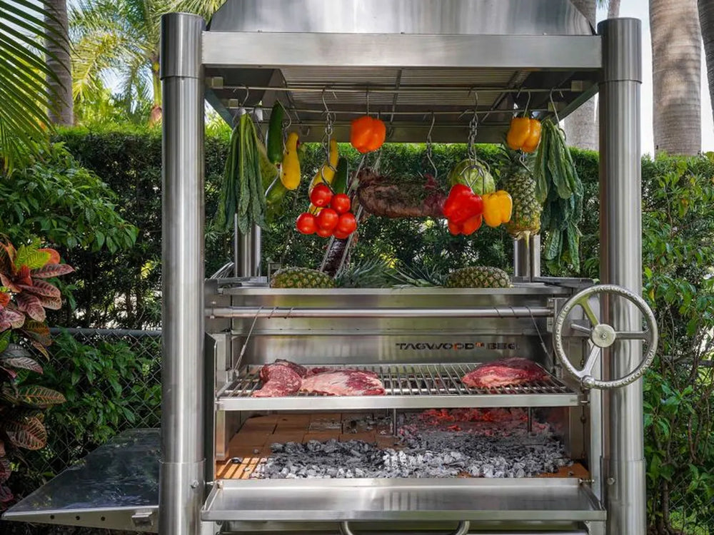 Tagwood BBQ BBQ12SS Gaucho grill with firebox door open and interior grate system