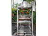 Tagwood BBQ BBQ12SS 6-Zone stainless steel grill cooking steaks over charcoal