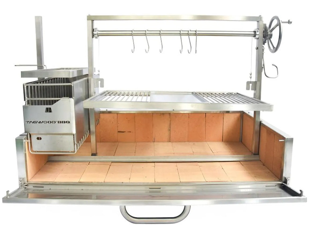 Tagwood BBQ25SS XL built-in Santa Maria grill open firebox view with split cooking grates and refractory brick interior