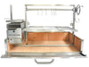 Tagwood BBQ25SS XL built-in Santa Maria grill open firebox view with split cooking grates and refractory brick interior
