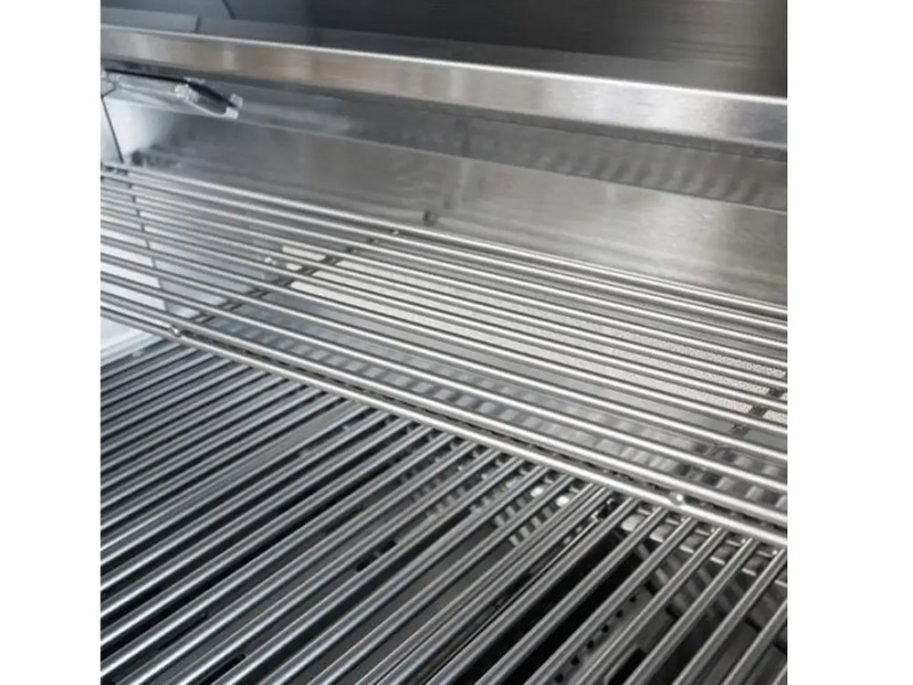 Cooking surface of the Broilmaster 25 inch grill showing warming rack and primary stainless steel cooking grates
