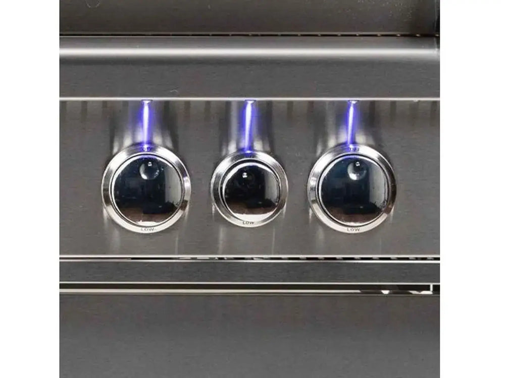 Close-up of three illuminated control knobs with blue LED lighting on the grill's front panel.