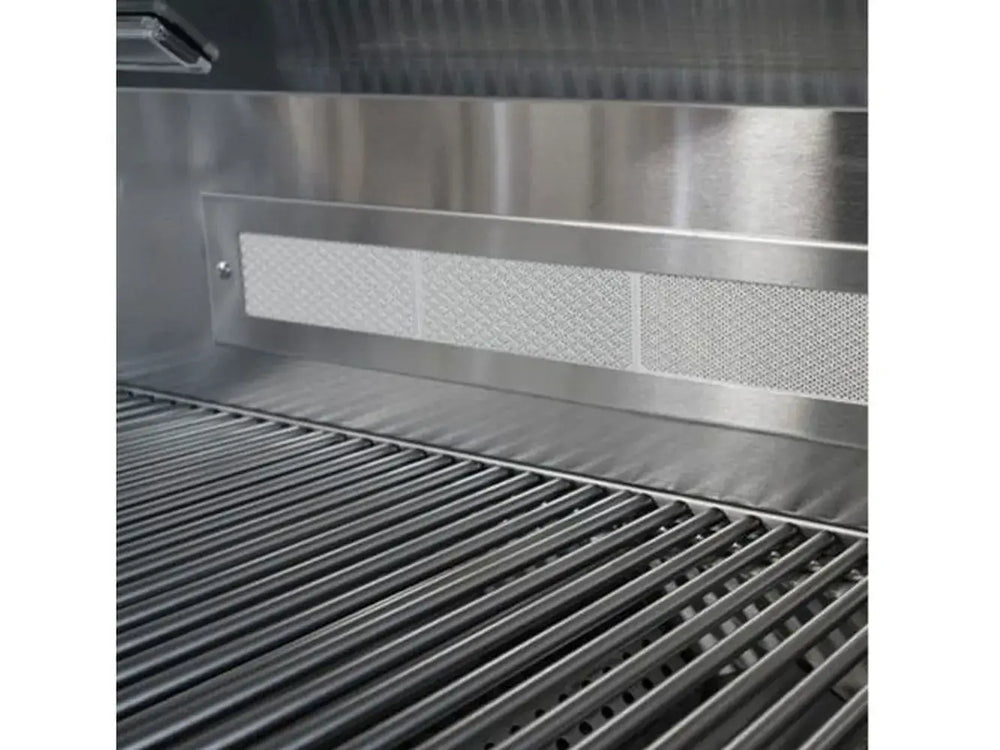 Interior view of grill showing heavy-duty stainless steel cooking grates and rear ceramic infrared burner.