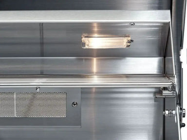 Built-in hood light for the Broilmaster stainless steel grill, improving visibility during grilling.