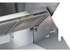 Stainless steel warming rack inside the Broilmaster grill hood for holding and slow cooking.