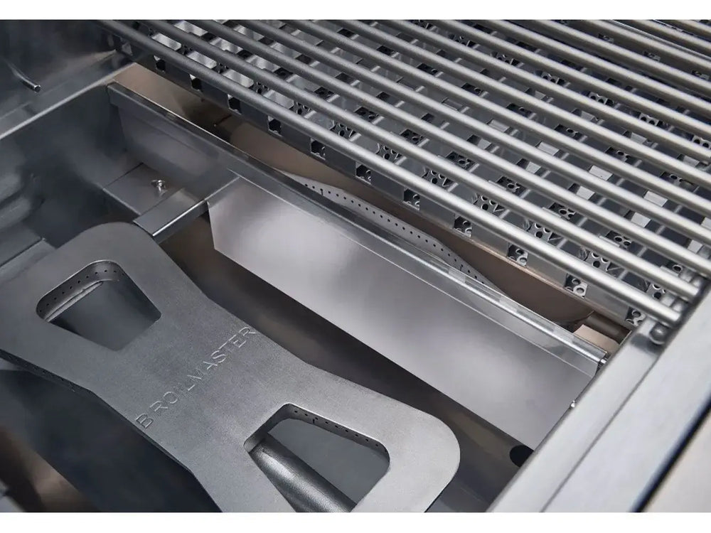 Heavy-duty cast stainless steel burner with Broilmaster logo, visible under the cooking grates