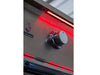 Close-up of True Flame grill control knob with red LED lighting and stainless steel finish.