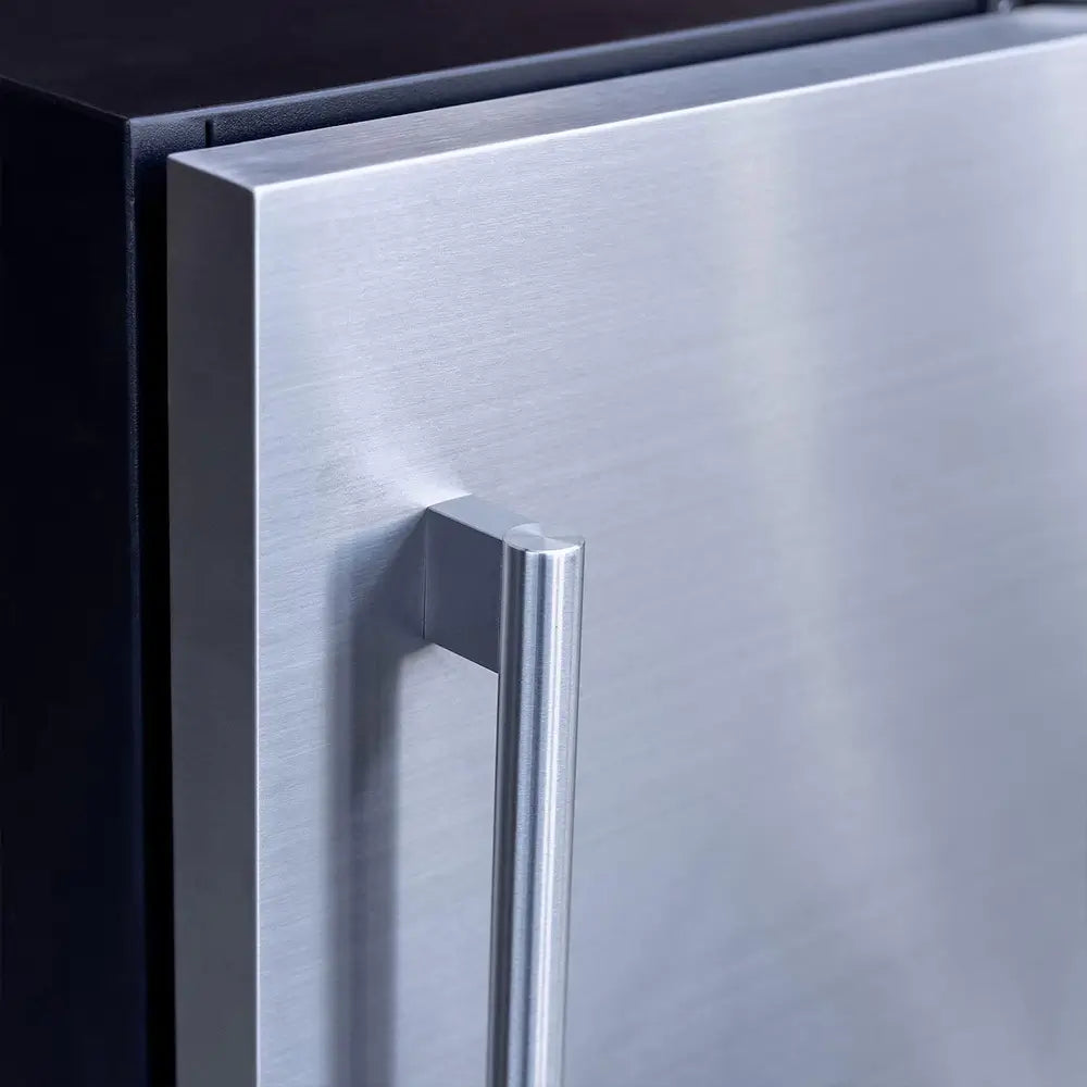 Summerset IM-15N Outdoor Ice Maker close-up of brushed stainless steel door and handle.