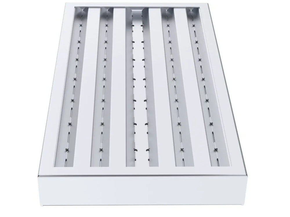 Top view of Sunstone charcoal tray channel insert with multiple troughs for wood chips or water reservoirs.