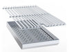 Stainless grill grate positioned above Sunstone perforated charcoal tray, showing how the tray sits under cooking grates.