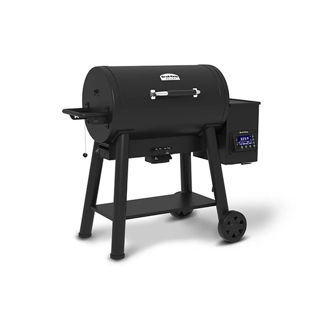 Angled product shot of the Broil King Crown Pellet 500 WiFi pellet smoker, highlighting the black barrel body, chrome lid handle, side-mounted digital control panel, front prep shelf, lower storage shelf, and rolling two-wheel design.