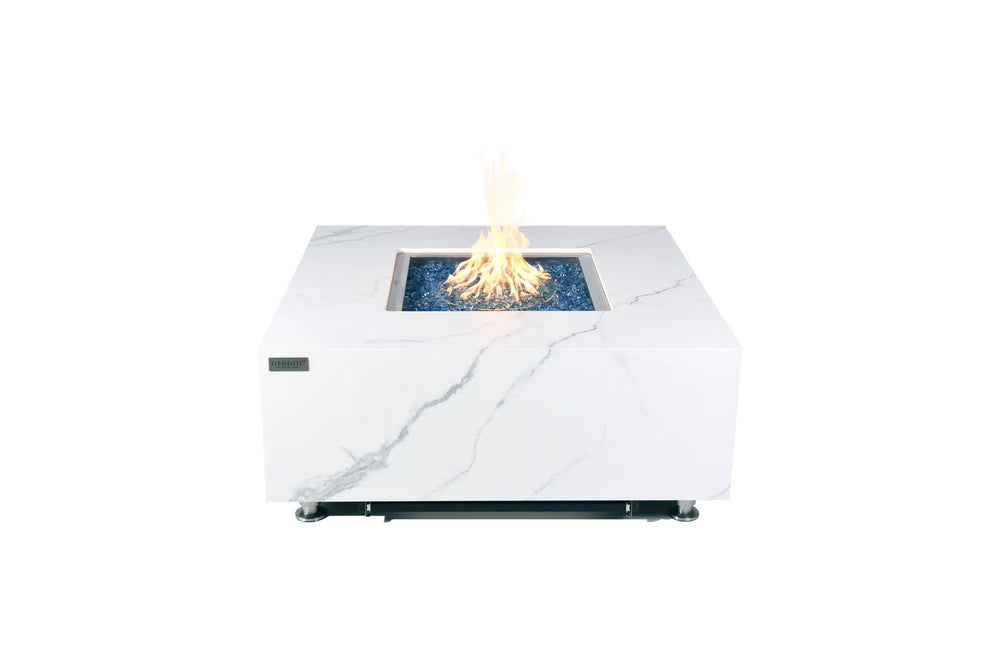 Studio shot of the Elementi Plus OFP103BW Bianco fire table with a powerful 60,000 BTU linear flame and dark glass fire media on a white background.