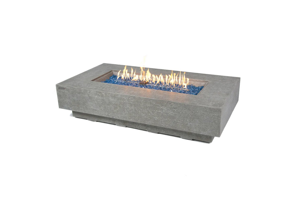 Elementi Plus Riviera OFG415LG light gray rectangular fire table with blue fire glass and flame.
