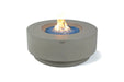 Elementi Plus Colosseo OFG414LG light gray round fire table with blue fire glass and flame.