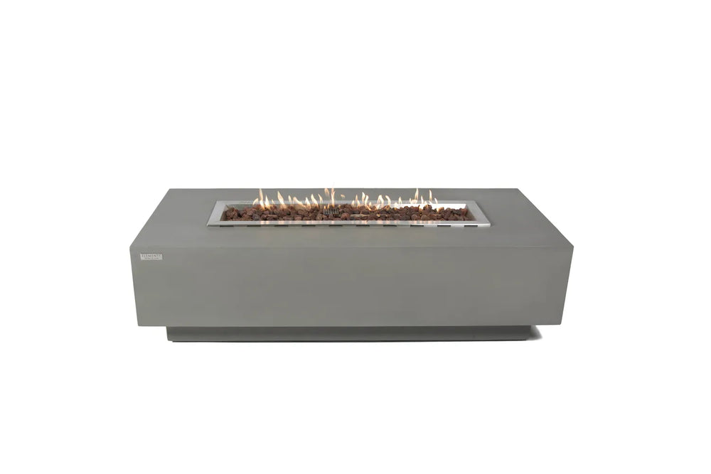 Lit 59.8" Elementi Granville OFG121LG Fire Table showcasing linear stainless steel burner and grey finish.