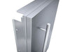 Close-up of Sunstone DE-DVR15 stainless access door edge and vertical handle, showing trim frame and mounting flange.