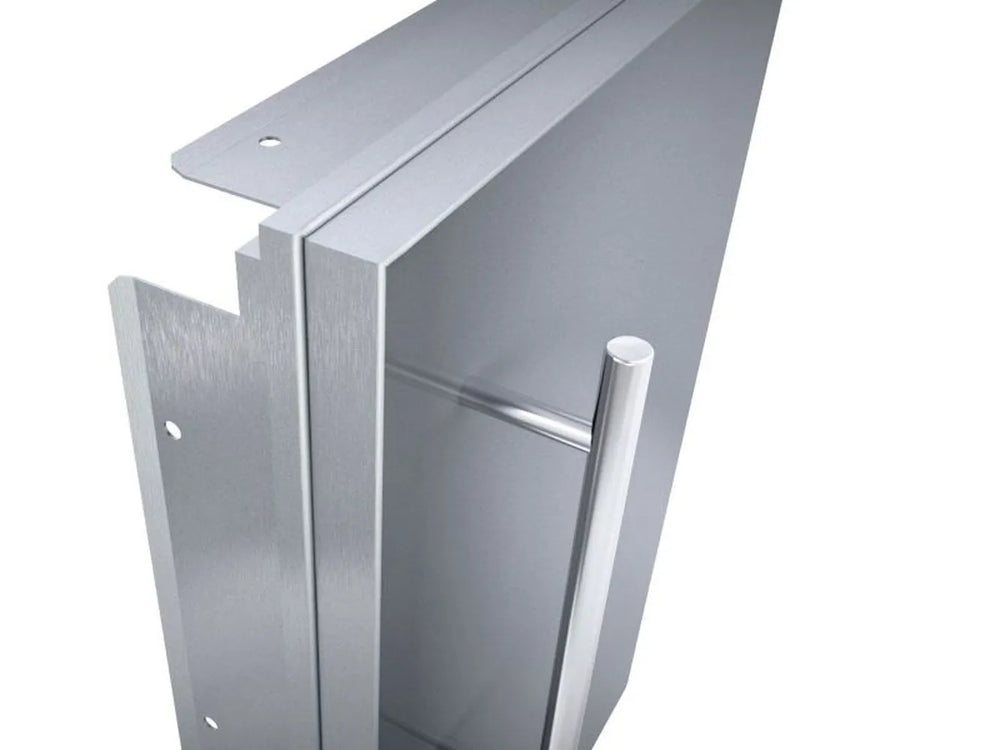 Close-up of Sunstone DE-DD42 raised stainless door frame edge and vertical handle for outdoor kitchen access doors.