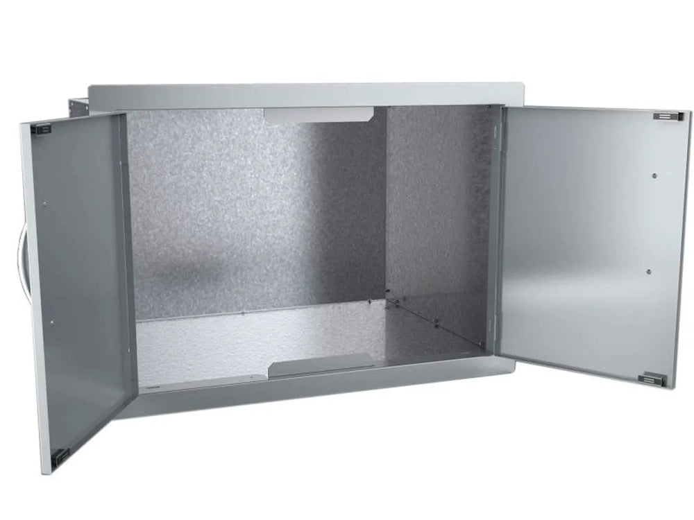 Both doors open showing the large interior cavity (dry storage space) and inner door panels.