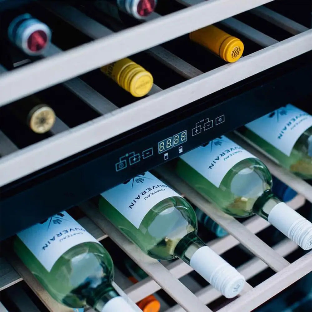 Close-up of Summerset RFR-24WD internal dual zone digital controls and wine bottles on wood shelves.