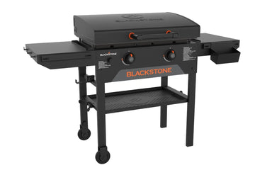 Side view of Blackstone 28-inch Omni griddle with foldable side shelves, hood closed