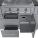 Close-up of the Sunstone gas grill control panel with three chrome knobs, featuring an open lower cabinet and pull-out storage drawers for outdoor kitchen organization.