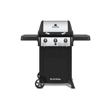 Broil King Gem 310 compact freestanding gas grill, front view with stainless steel lid, three control knobs, black side shelves, enclosed lower cabinet, and wheeled cart base