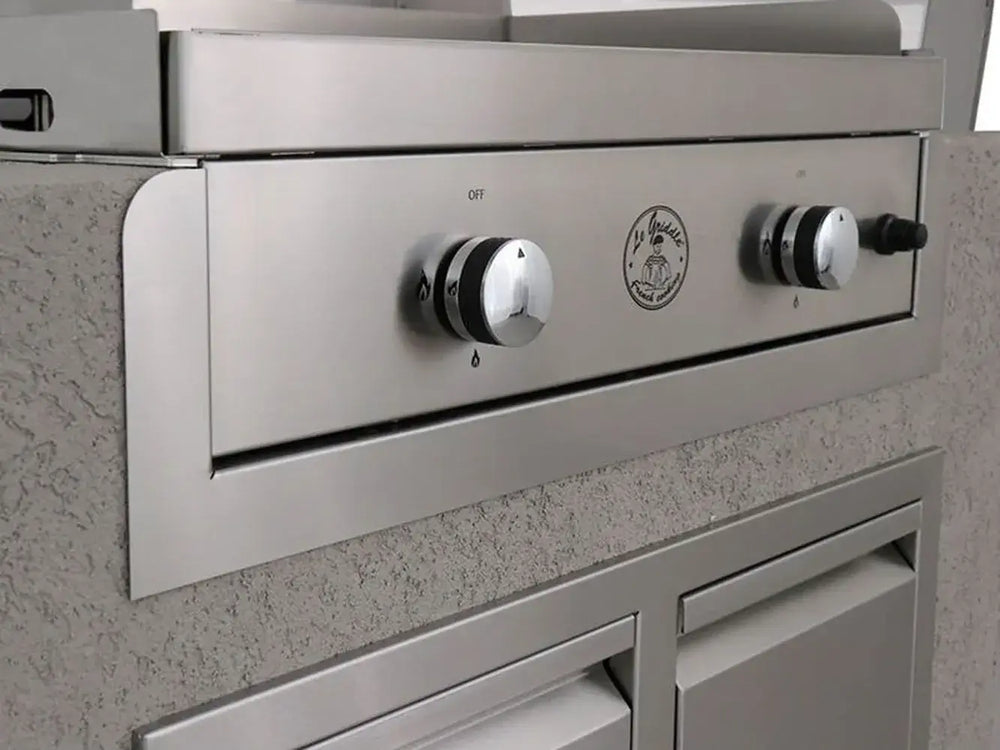Close-up showing the seamless, polished fit of the Le Griddle Trim Kit installed around the built-in griddle.