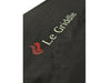 Close-up of the Le Griddle logo embroidered on the durable black  protective fabric cover.